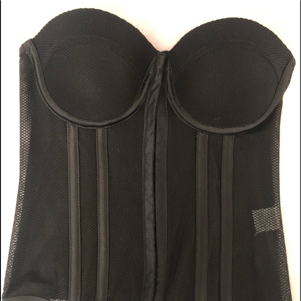 Black size small ; corset top. Never worn!